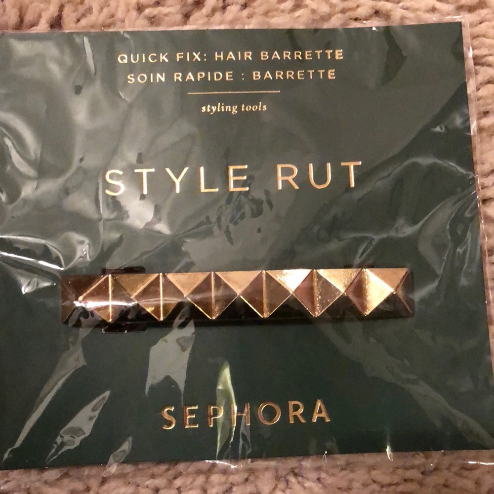 A gold hair barrette